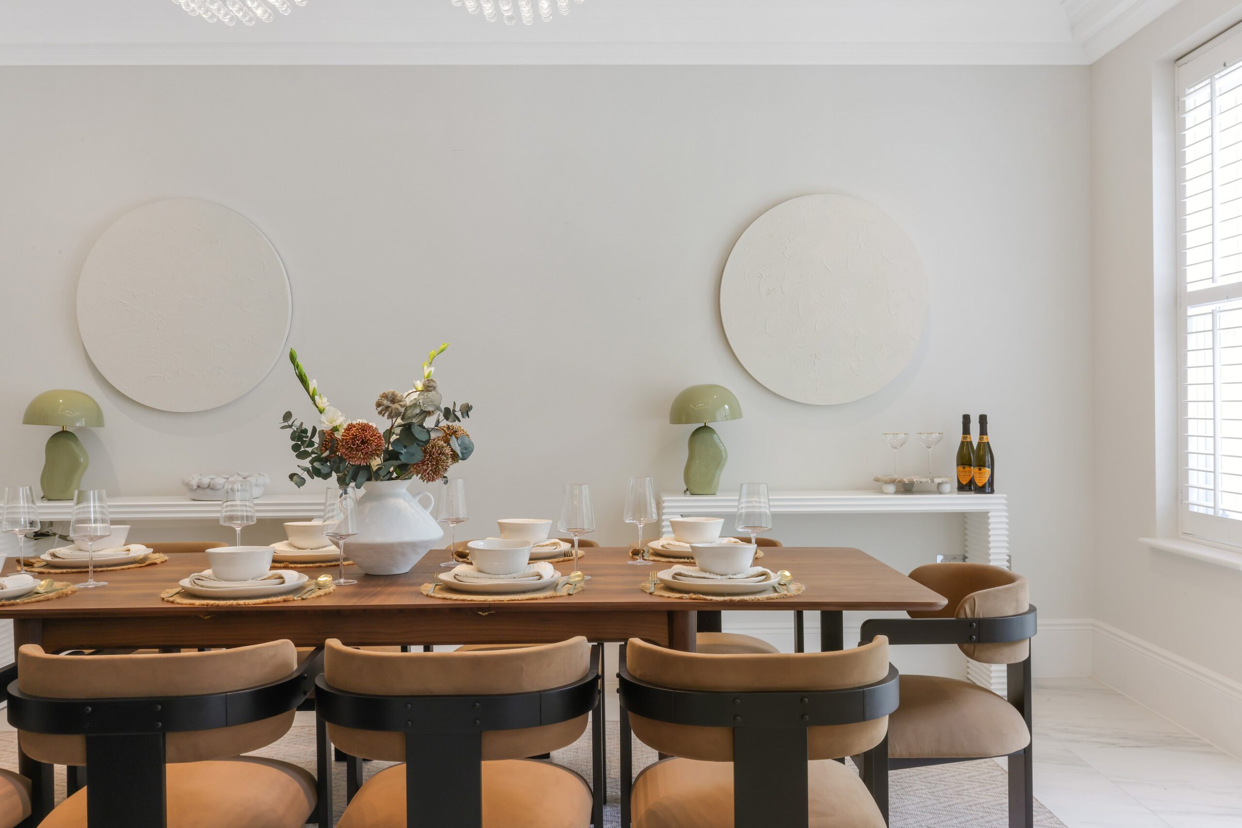 Before and after home staging of a Surrey dining room with brown table, chairs and chandelier