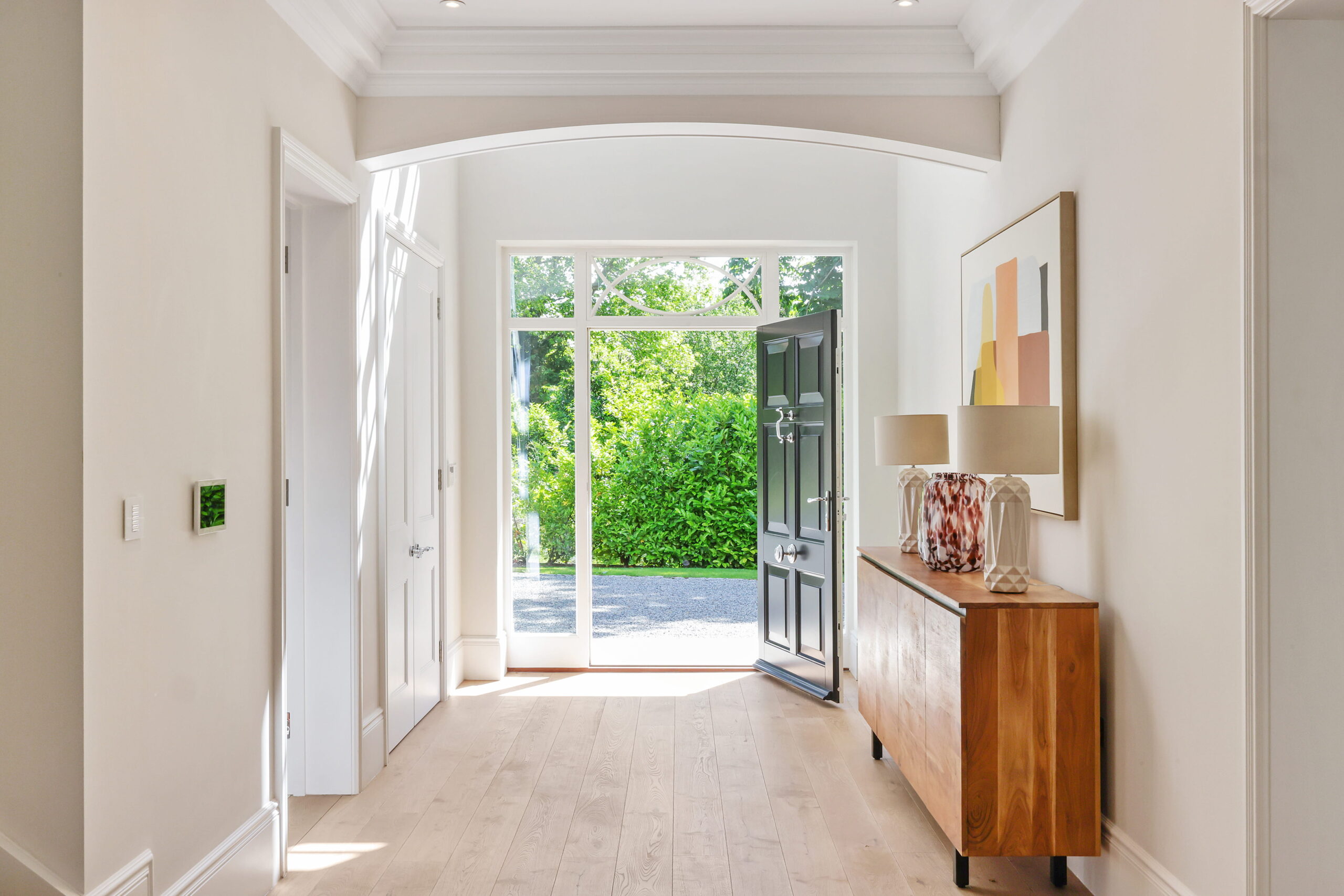 hallway interior styling for home stager in london with bespoke furniture and artwork