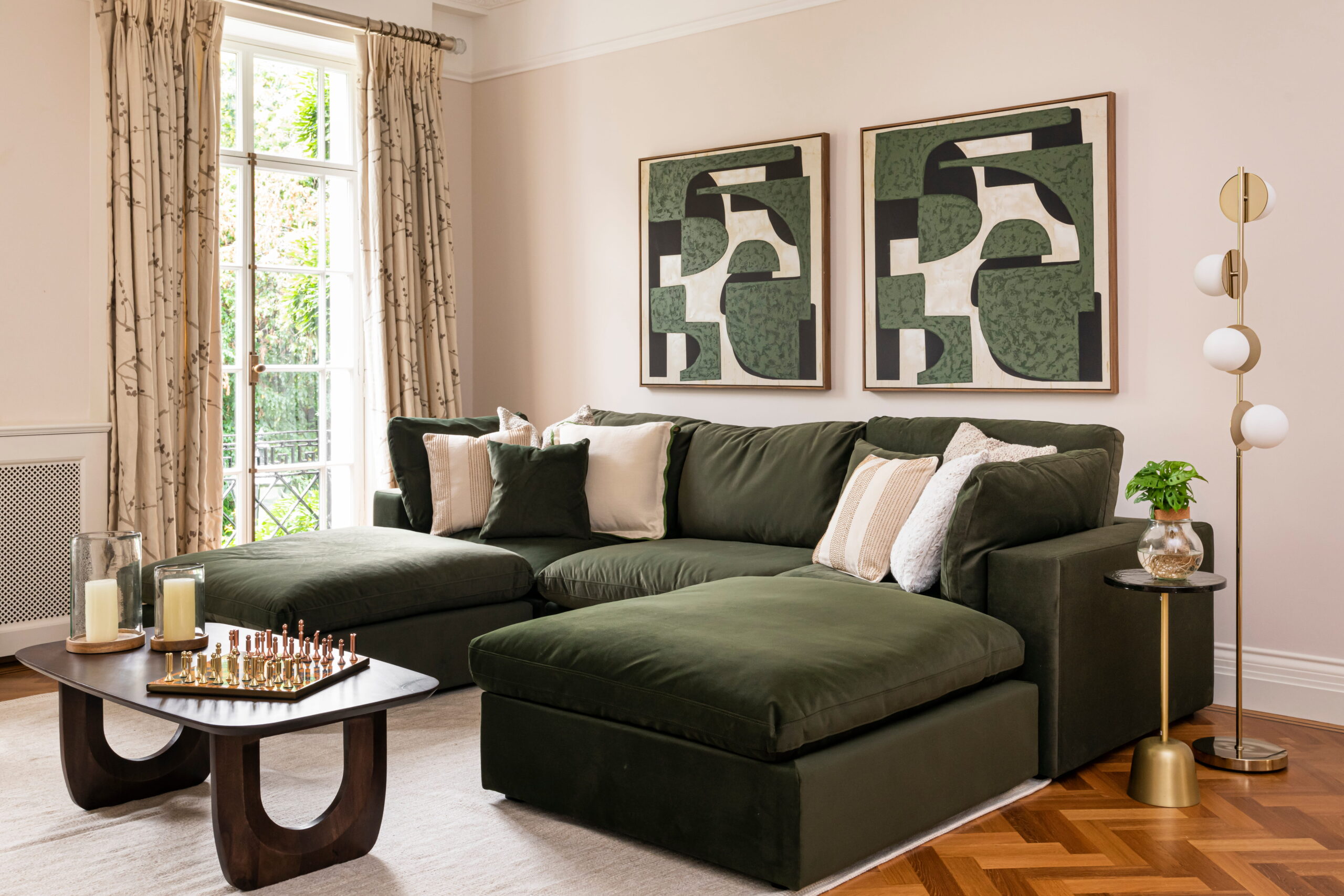 living room home stager transformation with green interior styling and neutral accessories