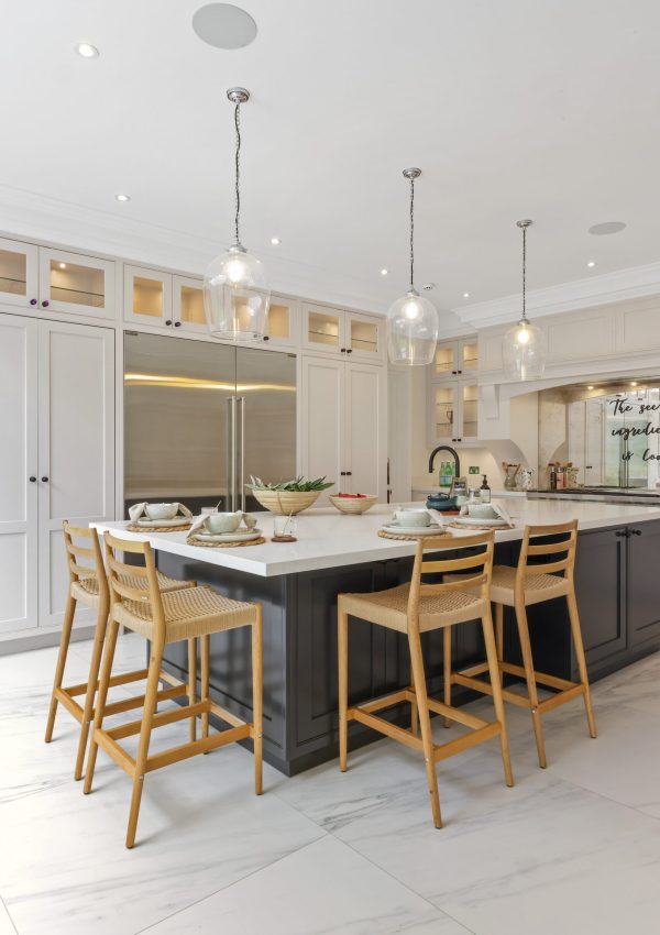 Before and after home staging of a Surrey open plan kitchen with oak furniture chairs